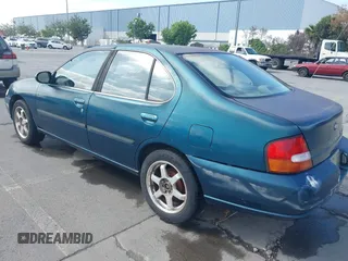 1998 Nissan Altima XE with VIN 1N4DL01D2WC254087, listed as a IAAI auction lot 42184722 with 255,372 mi miles and . Bid and sale history available at carsss.com. Image 3.