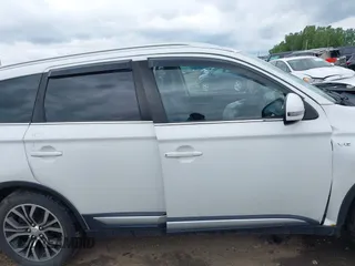 2017 Mitsubishi Outlander GT with VIN JA4JZ4AX9HZ018074, listed as a IAAI auction lot 42536932 with 149,925 mi miles and . Bid and sale history available at DreamBid. Image 13.