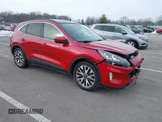 2020 Ford Escape Titanium Hybrid z VIN 1FMCU9DZ5LUA71069, wystawiony jako IAAI lot #41392166 z przebiegiem 97 645 mil mil oraz . Historia ofert i sprzedaży dostępna na DreamBid. Obrazek 1.