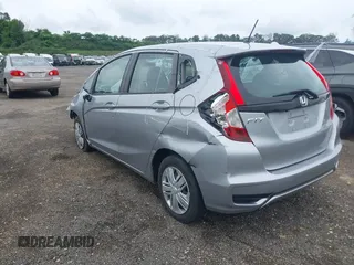 2019 Honda Fit LX z VIN 3HGGK5H45KM725916, wystawiony jako IAAI lot #42654907 z przebiegiem 92 580 mil mil oraz . Historia ofert i sprzedaży dostępna na DreamBid. Obrazek 3.