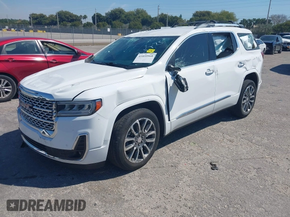 2021 GMC Acadia Denali with VIN 1GKKNPLS9MZ124774, listed as a IAAI auction lot 41859968 with 46,592 mi miles and . Bid and sale history available at carsss.com. Image 18.