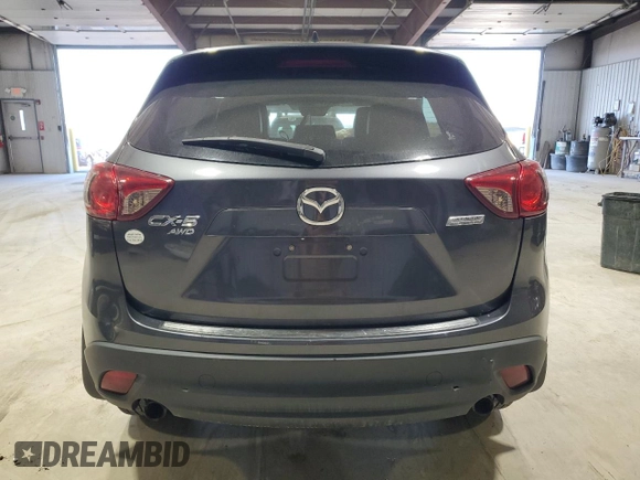 2014 Mazda CX-5 Grand Touring with VIN JM3KE4DY3E0337732, listed as a Copart auction lot 50102235 with 143,109 mi miles and Salvage Title. Bid and sale history available at carsss.com. Image 6.