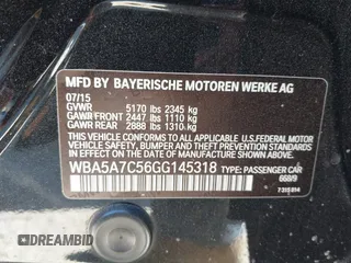 2016 BMW 5 Series 528i xDrive with VIN WBA5A7C56GG145318, listed as a IAAI auction lot 41414556 with 122,879 mi miles. Bid and sale history available at carsss.com. Image 9.