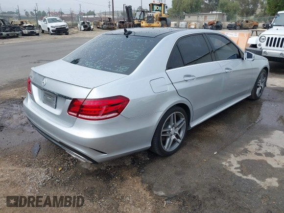 2014 Mercedes-Benz E E 350 Sport with VIN WDDHF5KB8EB009303, listed as a IAAI auction lot 42014846 with 97,214 mi miles. Bid and sale history available at carsss.com. Image 4.