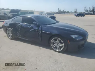 2013 BMW 6 Series 650i z VIN WBAYM9C54DDW20137, wystawiony jako Copart lot #54526085 z przebiegiem 57 593 mil mil oraz Szkoda całkowita • Salvage title. Historia ofert i sprzedaży dostępna na DreamBid. Obrazek 4.