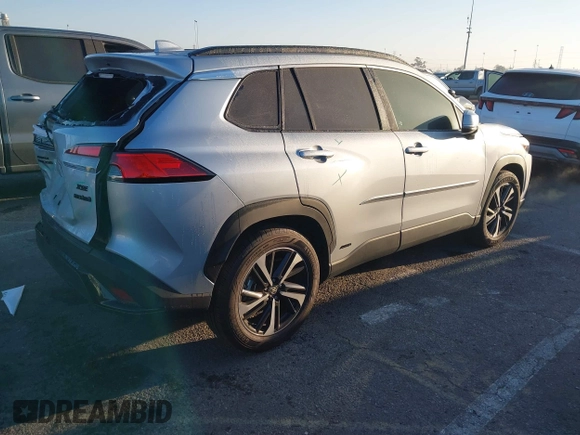 2024 Toyota Corolla Cross Hybrid S with VIN 7MUFBABG3RV042764, listed as a IAAI auction lot 41631118 with 12,718 mi miles and . Bid and sale history available at DreamBid. Image 4.