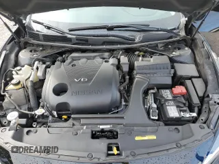 2021 Nissan Maxima SV z VIN 1N4AA6CV5MC514402, wystawiony jako Copart lot #56296955 z przebiegiem 59 428 mil mil oraz Szkoda całkowita • Salvage title. Historia ofert i sprzedaży dostępna na DreamBid. Obrazek 11.