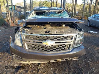 2018 Chevrolet Tahoe LT with VIN 1GNSKBKC7JR234467, listed as a IAAI auction lot 41276741 with 132,327 mi miles and . Bid and sale history available at DreamBid. Image 13.