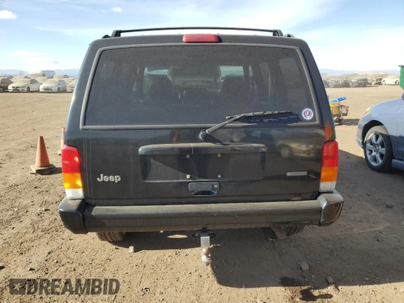 2001 Jeep Cherokee Sport with VIN 1J4FF58S71L540211, listed as a Copart auction lot 87089444 with 190,711 mi miles and Clean title. Bid and sale history available at DreamBid. Image 6.