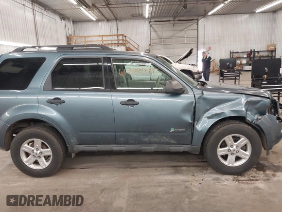 2011 Ford Escape Hybrid с VIN 1FMCU5K34BKC19603, выставлен на аукционе IAAI как лот 41895045 с пробегом 117 922 миль миль и . История ставок и продаж доступна на DreamBid. Изображение 14.