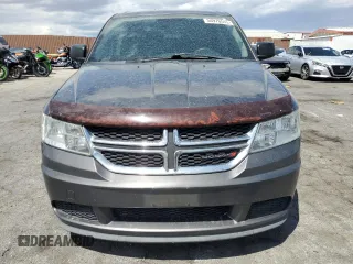 2014 Dodge Journey American Value Pkg with VIN 3C4PDCAB8ET256983, listed as a Copart auction lot 54976545 with 184,764 mi miles and Clean Title. Bid and sale history available at carsss.com. Image 5.