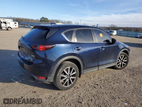 2018 Mazda CX-5 Touring with VIN JM3KFACM4J0470374, listed as a Copart auction lot 43048035 with 125,440 mi miles and Salvage Title. Bid and sale history available at carsss.com. Image 3.