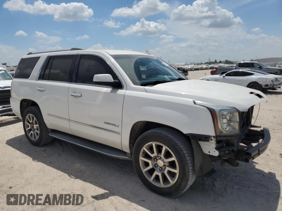 2015 GMC Yukon Denali with VIN 1GKS1CKJ3FR579085, listed as a Copart auction lot 67657084 with 98,456 mi miles and Salvage Title. Bid and sale history available at carsss.com. Image 4.