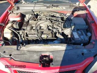 2004 Pontiac Grand Am SE2 with VIN 1G2NG52E84M672446, listed as a IAAI auction lot 40834541 with 209,231 mi miles. Bid and sale history available at carsss.com. Image 10.