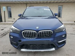 2017 BMW X1 xDrive28i with VIN WBXHT3C30H5F71011, listed as a Copart auction lot 51018645 with 83,203 mi miles and Clean Title. Bid and sale history available at carsss.com. Image 5.