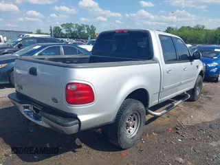 2001 Ford F-150 XLT z VIN 1FTRW07L81KA32285, wystawiony jako IAAI lot #42134835 z przebiegiem 189 109 mil mil oraz . Historia ofert i sprzedaży dostępna na DreamBid. Obrazek 4.
