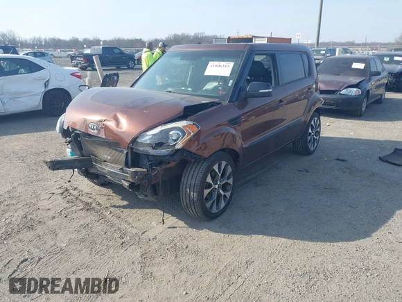 2012 Kia Soul + with VIN KNDJT2A6XC7422394, listed as a IAAI auction lot 41806315 with 165,268 mi miles. Bid and sale history available at carsss.com. Image 2.