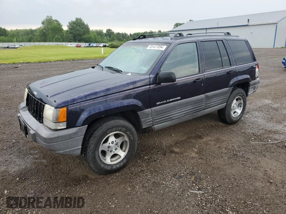1998 Jeep Grand Cherokee Laredo with VIN 1J4GZ58SXWC144437, listed as a Copart auction lot 60437094 with 183,908 mi miles and Salvage Title. Bid and sale history available at carsss.com. Image 1.