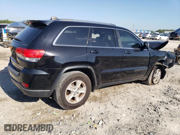 2017 Jeep Grand Cherokee Laredo with VIN 1C4RJEAG4HC952605, listed as a Copart auction lot 56693145 with 115,035 mi miles and Salvage title. Bid and sale history available at DreamBid. Image 3.
