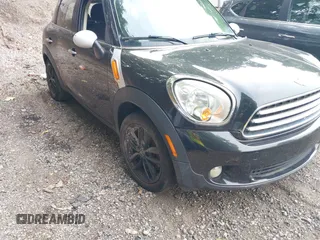 2012 MINI Countryman with VIN WMWZB3C5XCWM30191, listed as a IAAI auction lot 42435291 with 103,254 mi miles and . Bid and sale history available at DreamBid. Image 6.