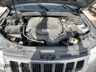 2012 Jeep Grand Cherokee Laredo with VIN 1C4RJEAG1CC306950, listed as a Copart auction lot 84912434 with 128,659 mi miles and Salvage Title. Bid and sale history available at carsss.com. Image 12.