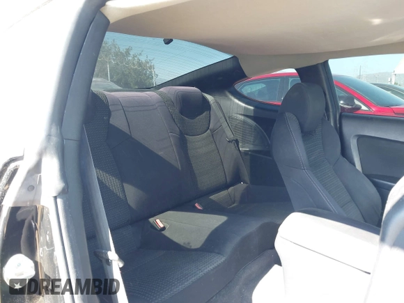 2010 Hyundai Genesis Coupe Premium with VIN KMHHT6KD6AU031014, listed as a IAAI auction lot 42684590 with 238,579 mi miles and . Bid and sale history available at DreamBid. Image 8.