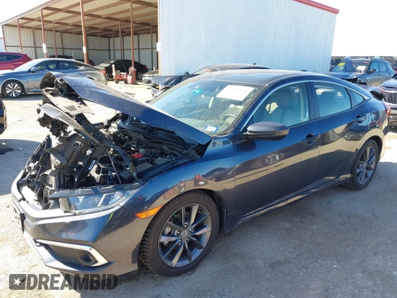 2019 Honda Civic Sedan EX with VIN JHMFC1F31KX005256, listed as a IAAI auction lot 41765551 with 80,897 mi miles. Bid and sale history available at carsss.com. Image 2.