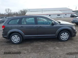 2014 Dodge Journey American Value with VIN 3C4PDCAB7ET151254, listed as a IAAI auction lot 41962026 with 161,115 mi miles and . Bid and sale history available at DreamBid. Image 13.
