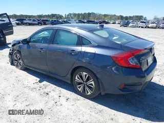 2016 Honda Civic EX-L with VIN 19XFC1F72GE044319, listed as a IAAI auction lot 41823220 with 129,868 mi miles and . Bid and sale history available at DreamBid. Image 3.
