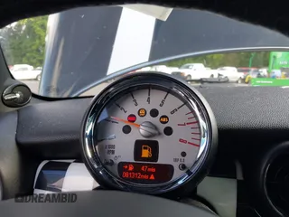 2013 MINI Hardtop S with VIN WMWSV3C53DT477574, listed as a IAAI auction lot 42385383 with 81,312 mi miles and . Bid and sale history available at DreamBid. Image 7.