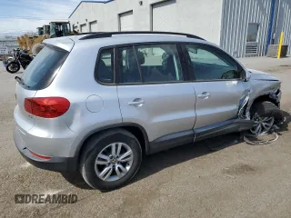 2017 Volkswagen Tiguan S with VIN WVGAV7AX1HK026998, listed as a Copart auction lot 74959504 with 93,696 mi miles and Salvage Title. Bid and sale history available at DreamBid. Image 3.