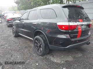 2013 Dodge Durango Crew with VIN 1C4RDJDG8DC675527, listed as a IAAI auction lot 42452197 with 184,981 mi miles and . Bid and sale history available at DreamBid. Image 3.