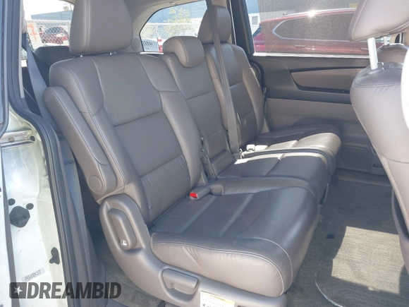 2015 Honda Odyssey Touring Elite with VIN 5FNRL5H91FB038099, listed as a IAAI auction lot 41829649 with 167,017 mi miles and . Bid and sale history available at DreamBid. Image 8.