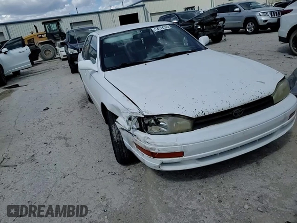 1994 Toyota Camry LE z VIN JT2SK12E0R0256694, wystawiony jako Copart lot #52819245 z przebiegiem 182 566 mil mil oraz Szkoda całkowita • Salvage title. Historia ofert i sprzedaży dostępna na DreamBid. Obrazek 11.