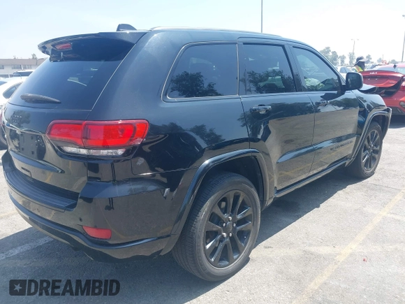 2018 Jeep Grand Cherokee Altitude with VIN 1C4RJEAG2JC428536, listed as a IAAI auction lot 42472960 with 74,631 mi miles and . Bid and sale history available at DreamBid. Image 4.