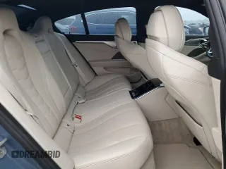 2022 BMW 8 Series M850i z VIN WBAGV8C08NCK07510, wystawiony jako Copart lot #84925344 z przebiegiem 16 955 mil mil oraz Szkody całkowita. Historia ofert i sprzedaży dostępna na DreamBid. Obrazek 10.
