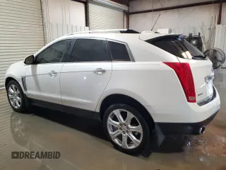 2015 Cadillac SRX Performance Collection with VIN 3GYFNCE36FS531134, listed as a Copart auction lot 54862205 with 103,051 mi miles and Clean title. Bid and sale history available at DreamBid. Image 2.