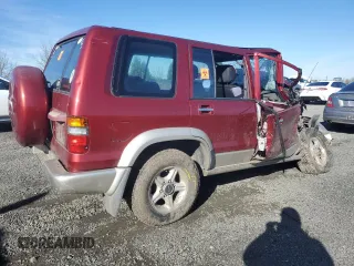 1999 Isuzu Trooper S with VIN JACDJ58X7X7931091, listed as a Copart auction lot 44824285 with Not provided miles and Salvage title. Bid and sale history available at DreamBid. Image 3.