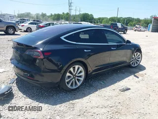 2018 Tesla Model 3 Long Range Battery with VIN 5YJ3E1EAXJF019907, listed as a IAAI auction lot 41995969 with Not Provided miles and . Bid and sale history available at DreamBid. Image 4.