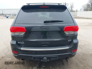 2014 Jeep Grand Cherokee Overland with VIN 1C4RJFCM8EC486259, listed as a IAAI auction lot 42105296 with 129,342 mi miles. Bid and sale history available at carsss.com. Image 16.