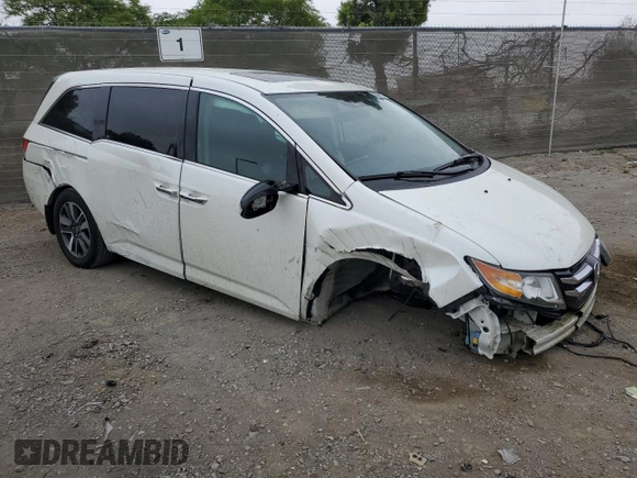 2014 Honda Odyssey Touring z VIN 5FNRL5H91EB089813, wystawiony jako Copart lot #58674275 z przebiegiem Nie podano mil oraz Szkoda całkowita • Salvage title. Historia ofert i sprzedaży dostępna na DreamBid. Obrazek 4.