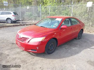 2009 Toyota Camry with VIN 4T1BE46K89U285834, listed as a IAAI auction lot 42062640 with 236,447 mi miles. Bid and sale history available at carsss.com. Image 2.