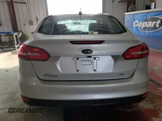 2018 Ford Focus SE with VIN 1FADP3F23JL214008, listed as a Copart auction lot 59692045 with 57,247 mi miles and Salvage title. Bid and sale history available at DreamBid. Image 6.
