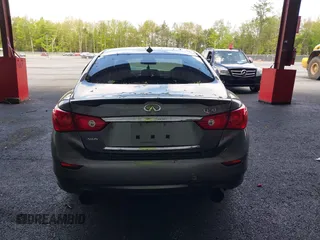 2015 Infiniti Q50 Premium z VIN JN1BV7AR3FM422042, wystawiony jako IAAI lot #42258784 z przebiegiem 72 030 mil mil oraz . Historia ofert i sprzedaży dostępna na DreamBid. Obrazek 16.