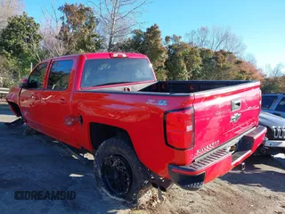 2018 Chevrolet Silverado 1500 LT with VIN 3GCUKREC7JG359913, listed as a IAAI auction lot 41848404 with 125,377 mi miles. Bid and sale history available at carsss.com. Image 3.