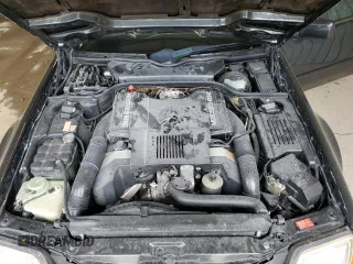 1992 Mercedes-Benz 500 z VIN WDBFA66E2NF038636, wystawiony jako Copart lot #55522605 z przebiegiem 92 002 mil mil oraz Szkody całkowita. Historia ofert i sprzedaży dostępna na DreamBid. Obrazek 11.
