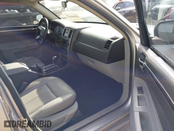 2006 Chrysler 300 Touring with VIN 2C3KA53G26H459048, listed as a IAAI auction lot 42049103 with 256,564 mi miles. Bid and sale history available at carsss.com. Image 5.
