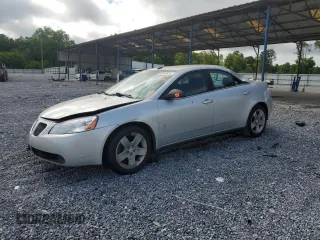 2009 Pontiac G6 1SA with VIN 1G2ZG57B594214564, listed as a Copart auction lot 61246855 with 194,769 mi miles and Salvage title. Bid and sale history available at DreamBid. Image 1.