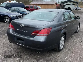 2010 Toyota Avalon XL with VIN 4T1BK3DB5AU353288, listed as a Copart auction lot 56857935 with 233,775 mi miles and Clean Title. Bid and sale history available at DreamBid. Image 4.