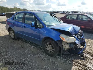 2012 Suzuki SX4 LE with VIN JS2YC5A31C6303361, listed as a Copart auction lot 74329394 with 136,420 mi miles and Salvage Title. Bid and sale history available at carsss.com. Image 4.